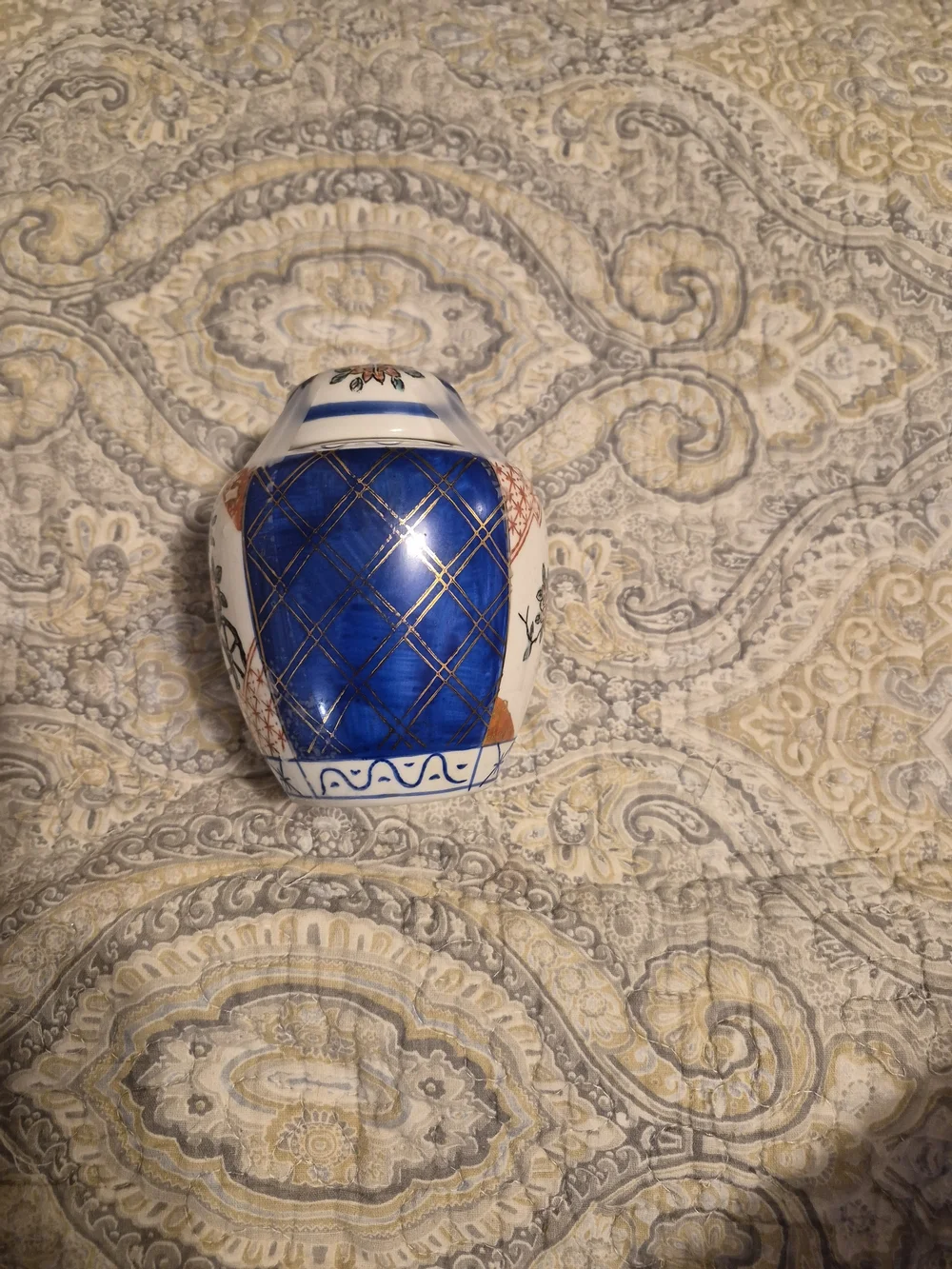 Hand-Painted Blue and White Decorative Vase with Floral Accents